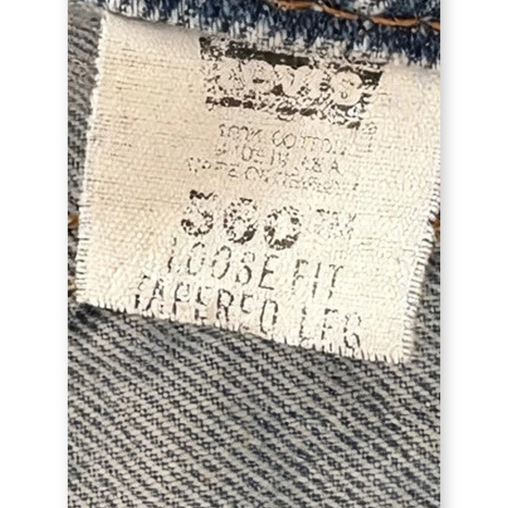 Vintage Levi's 560 Loose Fit Tapered Jeans — Light Wash — Size 24